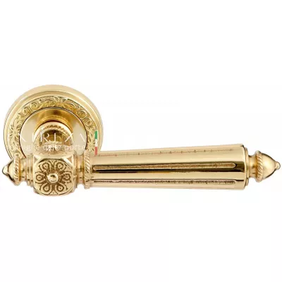 Дверная ручка Extreza LEON (Леон) 303 на розетке R06 полированная латунь F01