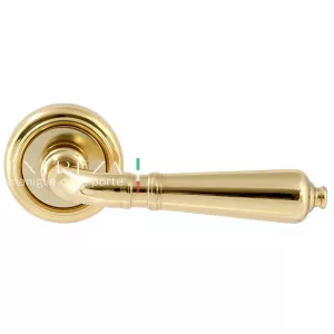 Дверная ручка PETRA (Петра) 304 на розетке R01 полированная латунь F01