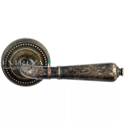 Дверная ручка Extreza PETRA (Петра) 304 на розетке R03 античная бронза F23