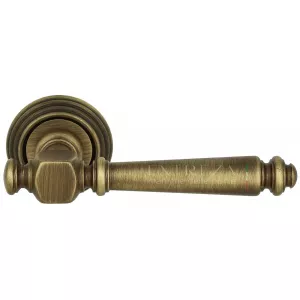 Дверная ручка VERONIKA (Вероника) 325 на розетке R05 матовая бронза F03