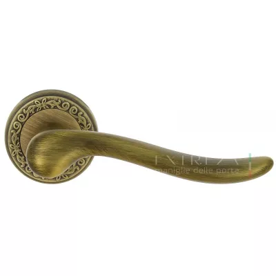 Дверная ручка Extreza TOLEDO (Толедо) 323 на розетке R06 матовая бронза F03