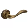 Дверная ручка Extreza "FLEXA" 335 круглая розетка R01 матовая бронза F03