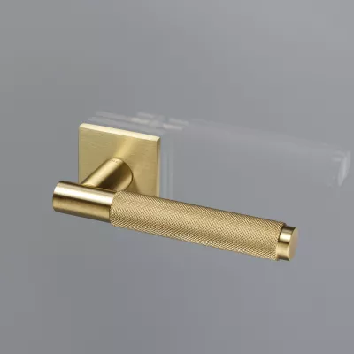 Дверная ручка Extreza HI-TECH "TUBA" 126 на розетке R15 матовая латунь глянец F07 / кольцо латунь